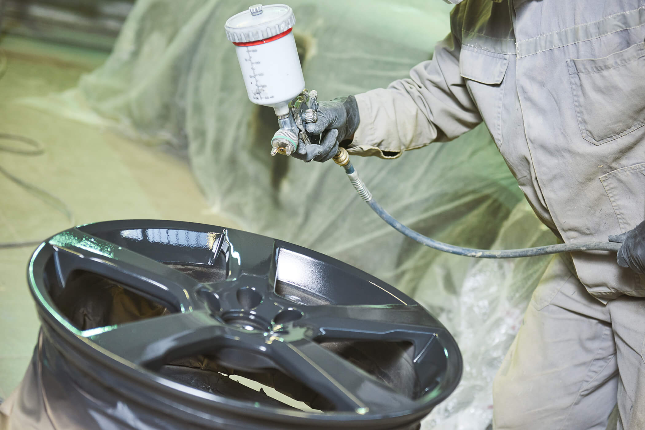 spraying alloy wheel