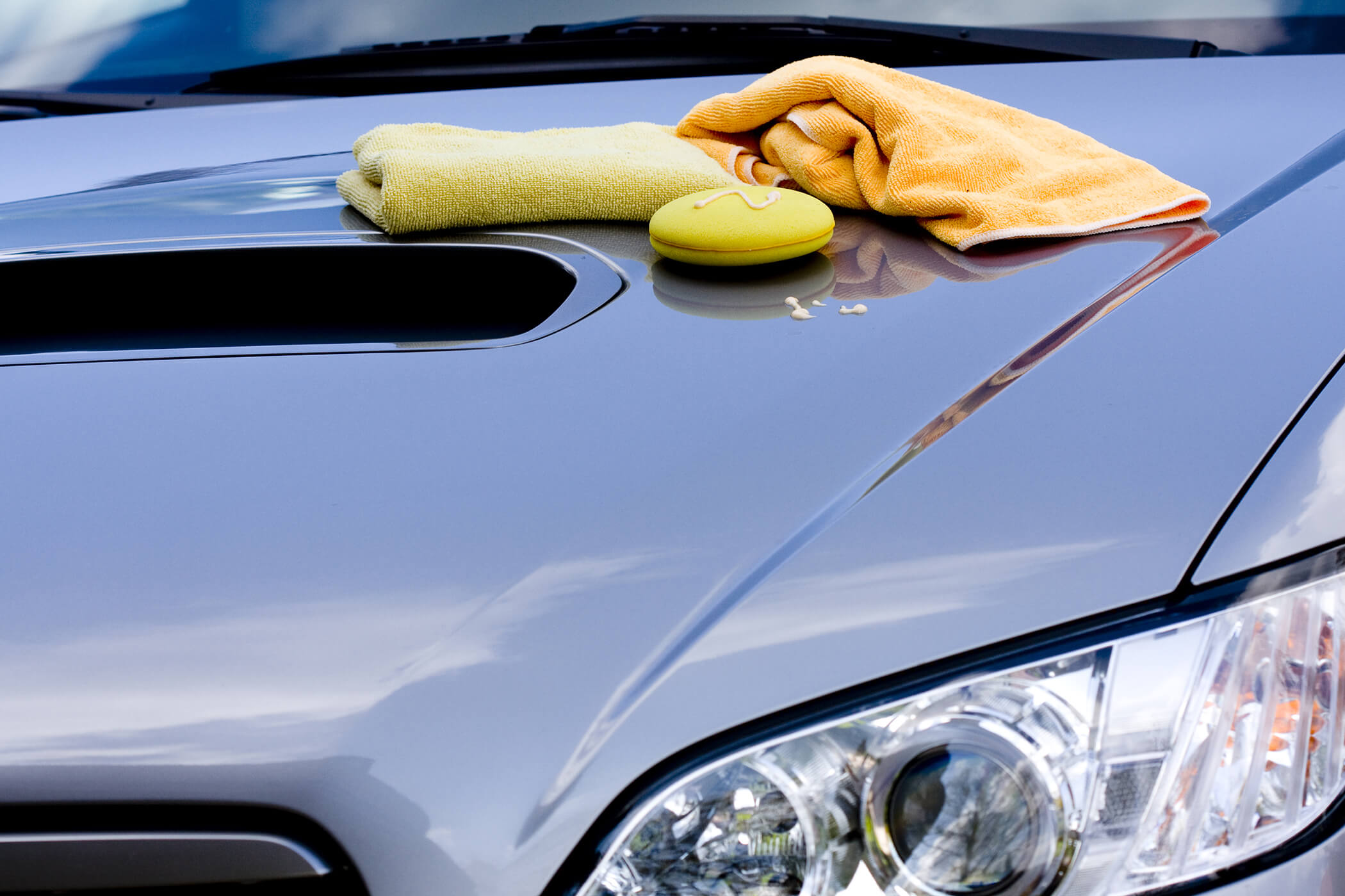 waxing and polishing car