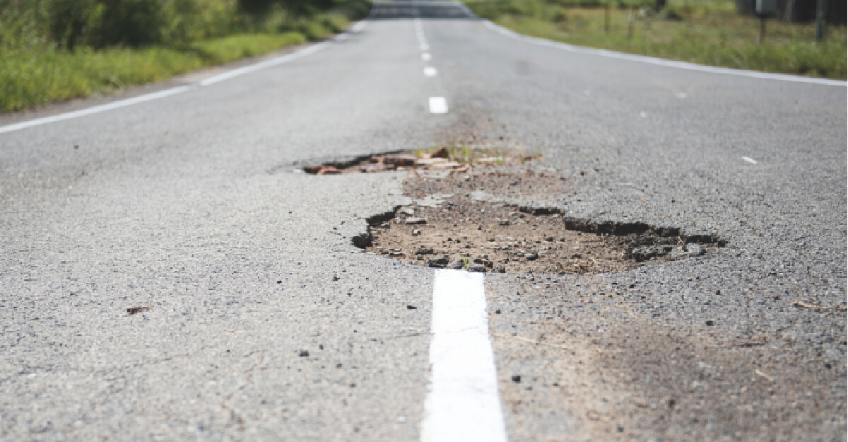 Pothole in road