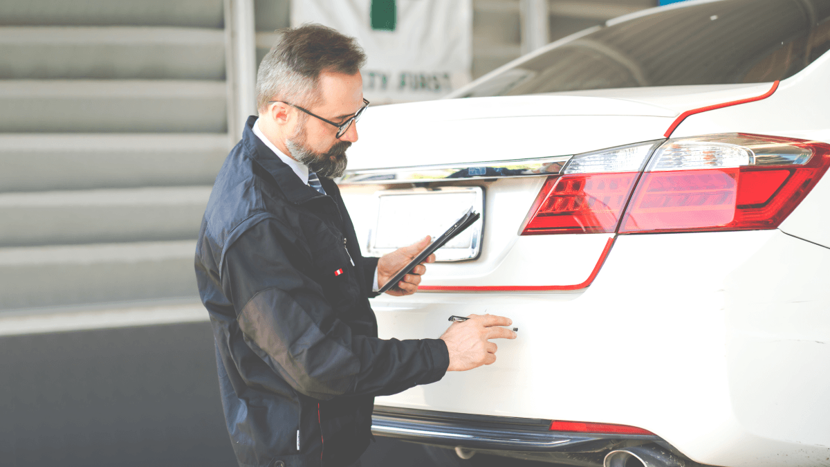 car being checked by garagist